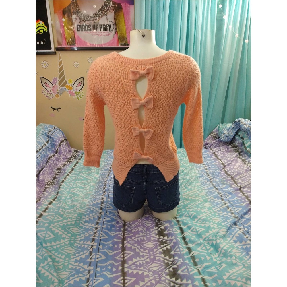 peach Delia's bow open back sweater size small